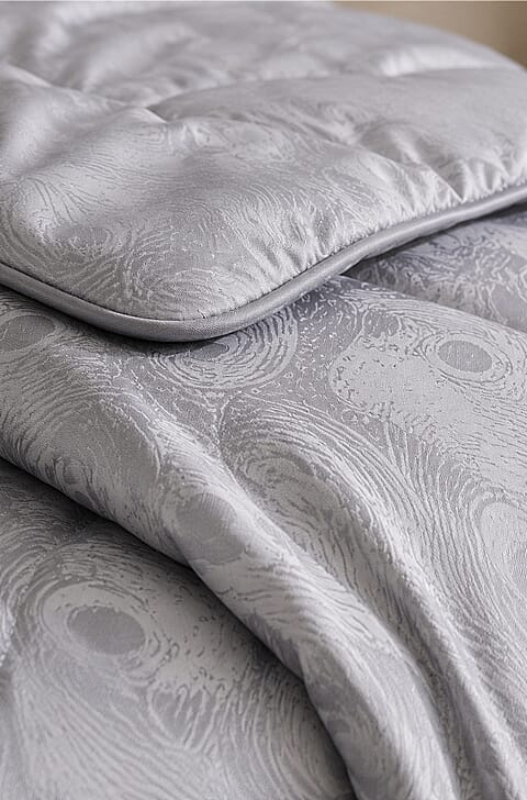 Hush Haven quilt — silk fabric close-up