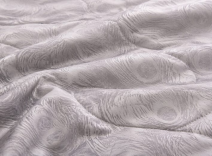 Hush Haven quilt printed peacock feather side