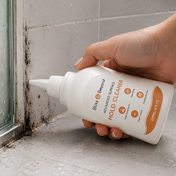 Mould Buster gel applied directly to bathroom grout — removing mould