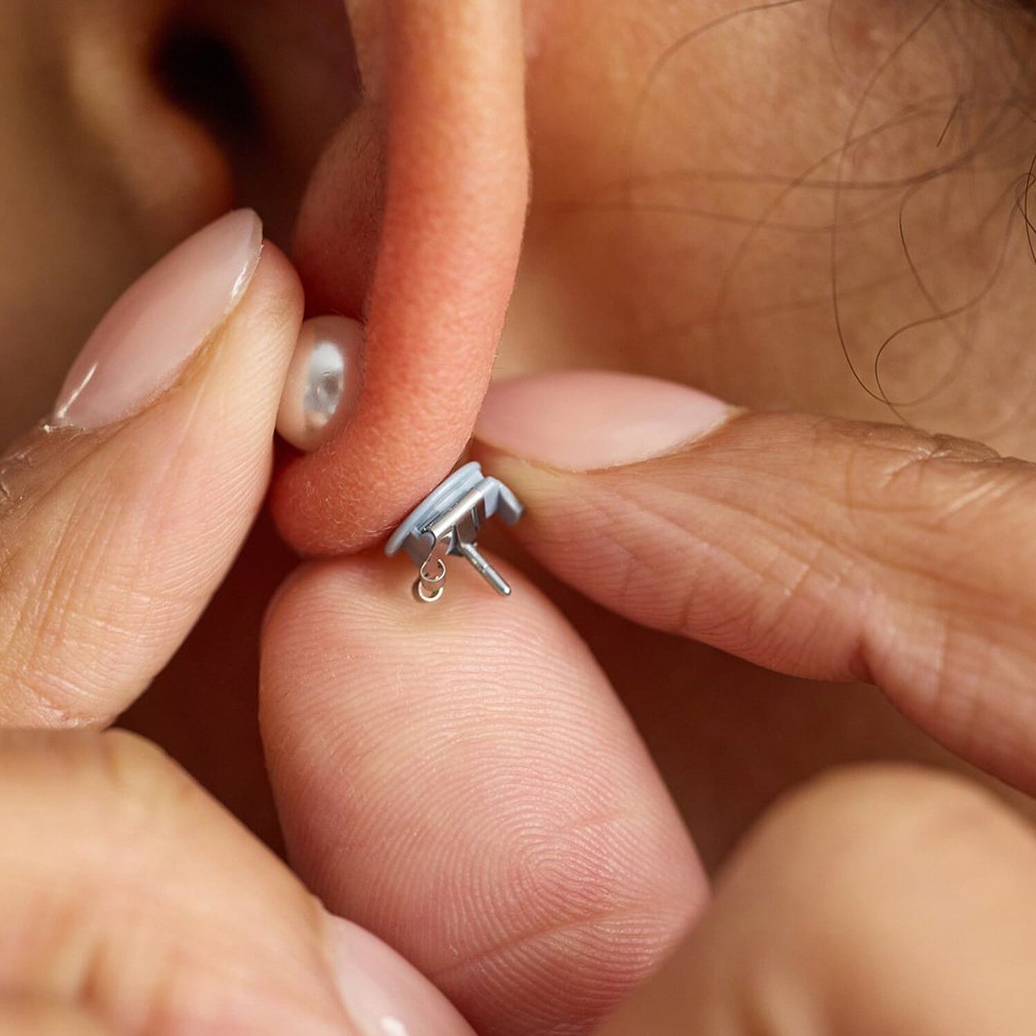 Connoisseurs LOX Secure Earring Backs - Set of Two Pcs Push Set in Silver Tone.