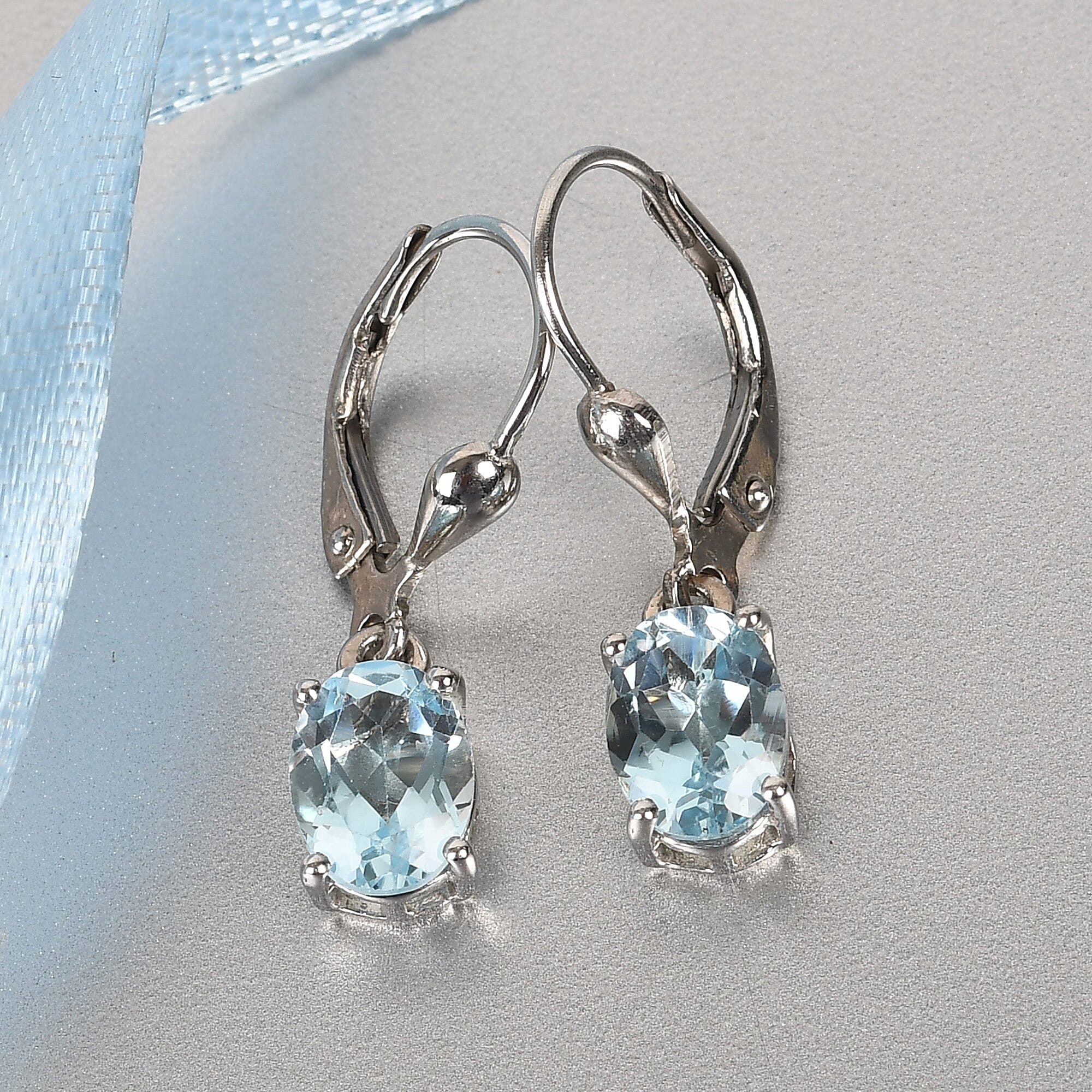 AA Sky Blue Topaz (Ovl) Lever Back Earrings in Platinum Overlay Sterling Silver 2.96 Ct.