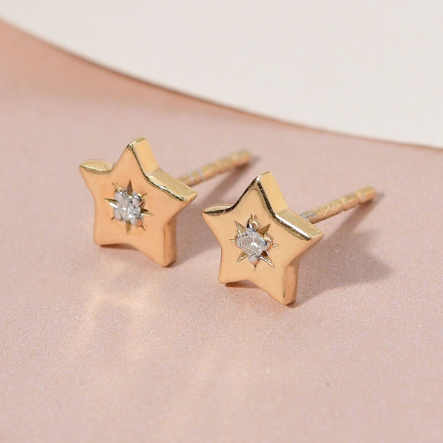 Star design hot sale gold earrings