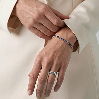 https://tjcuk.sirv.com/Products/34/9/3490293/0-50-Ct-Blue-Diamond-Half-Eternity-Band-Ring-in-Platinum-Plated-Sterli_3490293_3.jpg?w=342&h=342