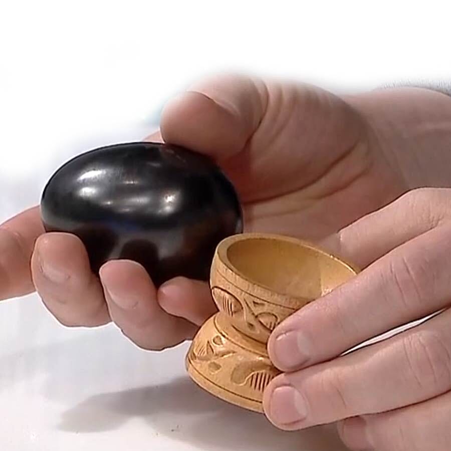 Oval Shape Shungite with Wooden Stand (Size 6x4.2x4.1 Cm) 660.00 Ct