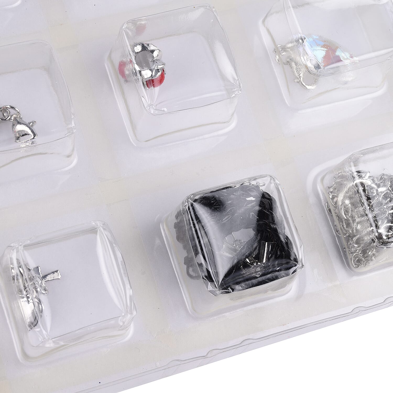 TJC Advent Calendar- 24 Pieces of Jewellery Including Necklace (Size 21.5), Bracelet,  Adjustable Rings, Pendants with Chain (Size 31 with Extender), Earrings and Charms