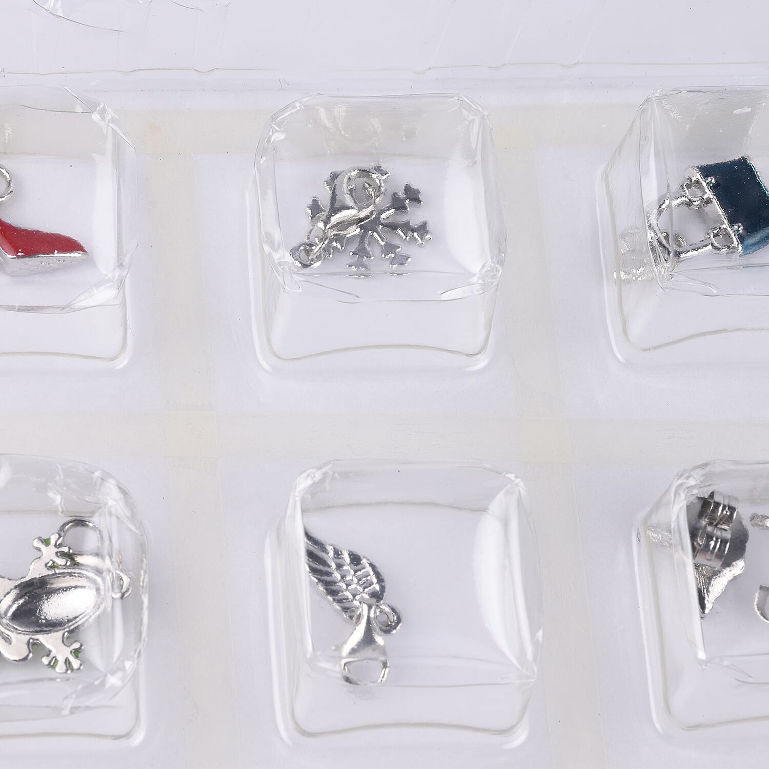 TJC Advent Calendar- 24 Pieces of Jewellery Including Necklace (Size 21.5), Bracelet,  Adjustable Rings, Pendants with Chain (Size 31 with Extender), Earrings and Charms