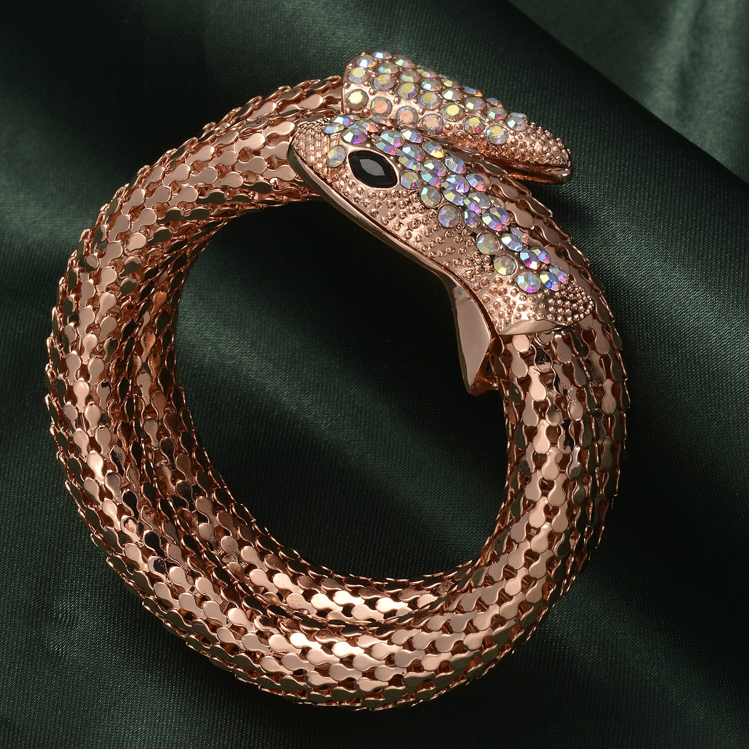 Simulated Mystic White Crystal and Simulated Black Spinel Snake Bracelet (Size 7.5) in Rose Gold Tone