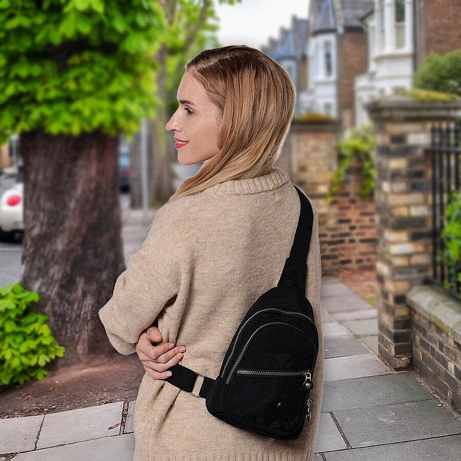 Black Colour Backpack with Zipper Closure and Adjustable Shoulder Strap (Size 17.5x6x20cm)