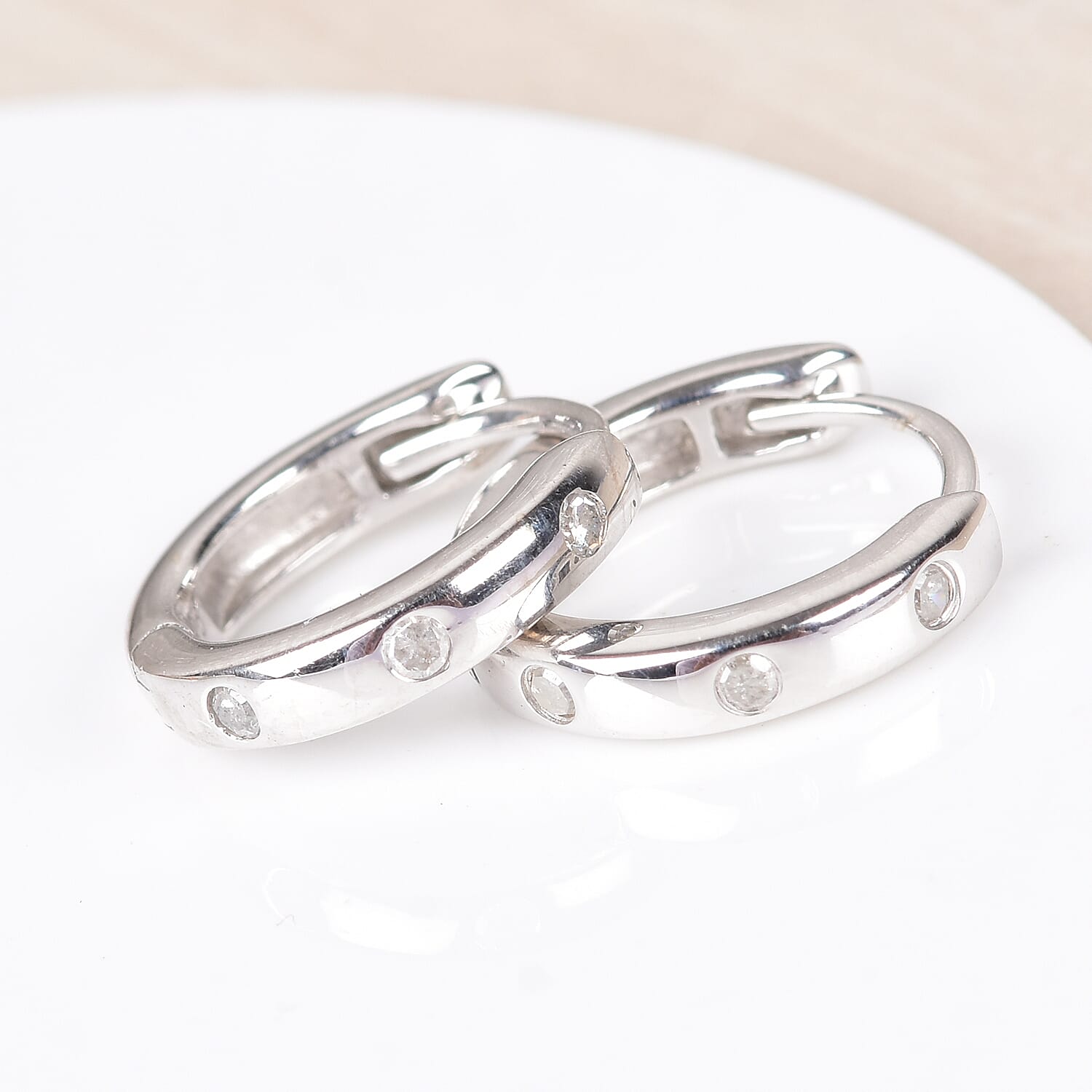 Diamond Huggie Hoop Earrings (with Clasp) Platinum Overlay Sterling Silver 0.10 Ct.