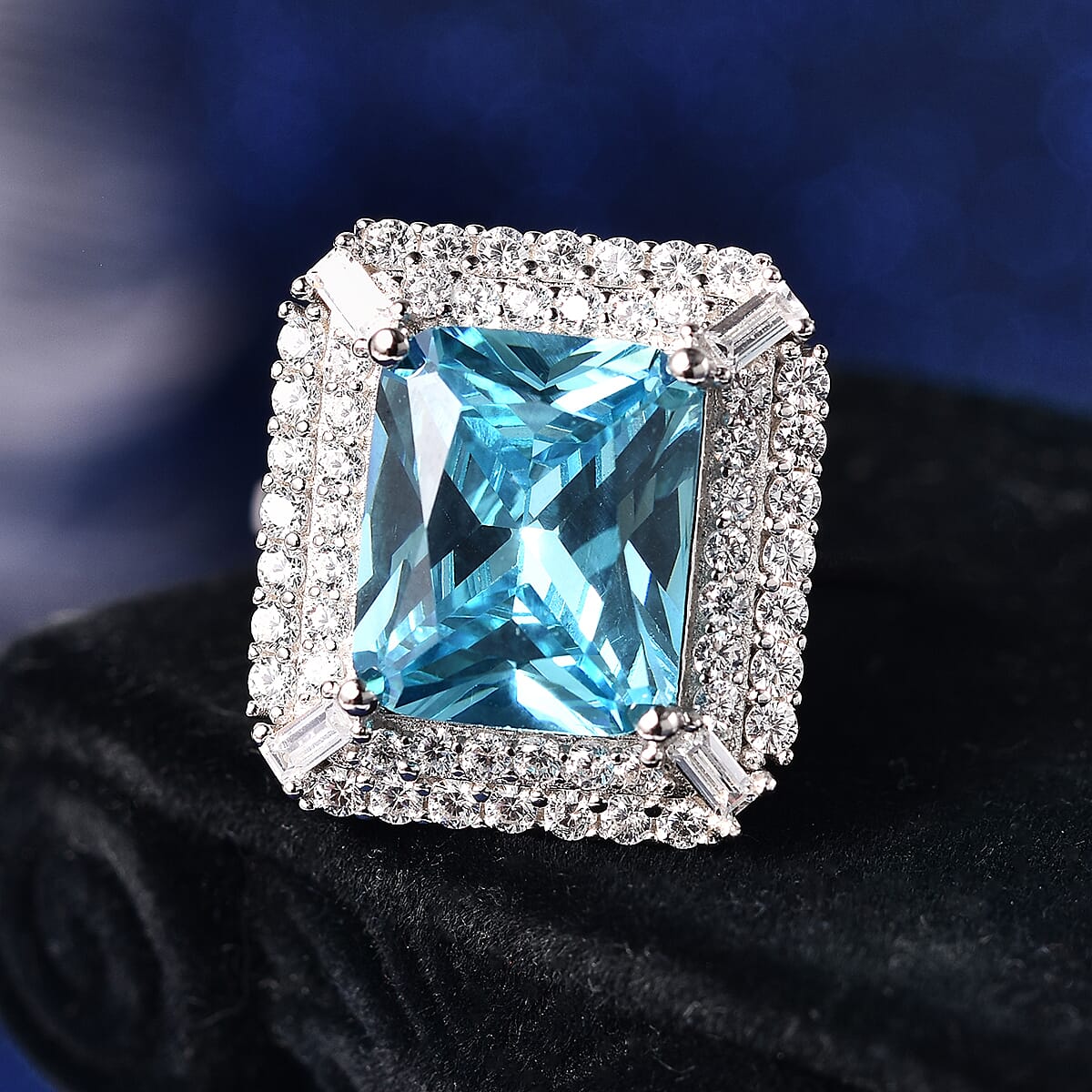 ELANZA Simulated Sky Blue Topaz and Simulated White Diamond Ring in Platinum Overlay Sterling Silver 12.40 Ct.