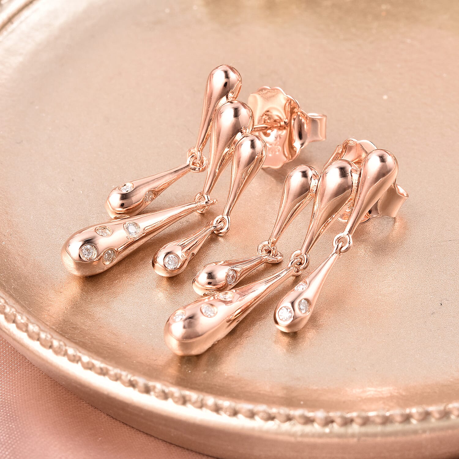 LucyQ Drip Collection - White Moissanite Earrings (with Push Back) in Rose Gold Overlay Sterling Silver, Silver wt. 9.84 Gms