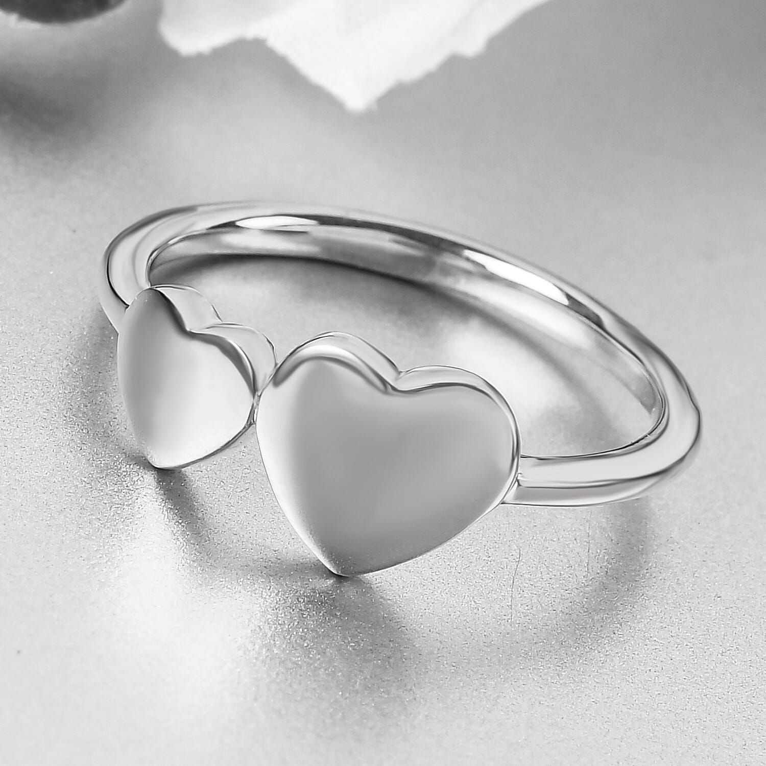 Silver ring with two hearts sale