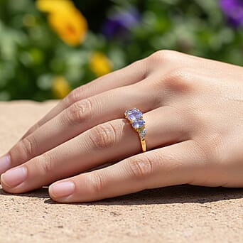 https://tjcuk.sirv.com/Products/37/1/3716240/Tanzanite-Trilogy-Ring-in-18K-Vermeil-Yellow-Gold-Plated-Sterling-Silv_3716240_2.jpg?w=342&h=342