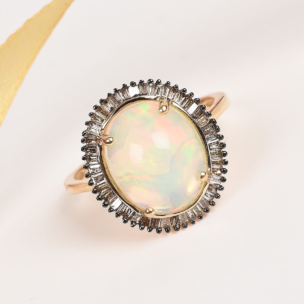 Cocktail Collection-9K Yellow Gold Ethiopian Welo Opal (Oval 12x10) and Diamond (Rnd 0.25 Cts) Ring 3.250 Ct.t.