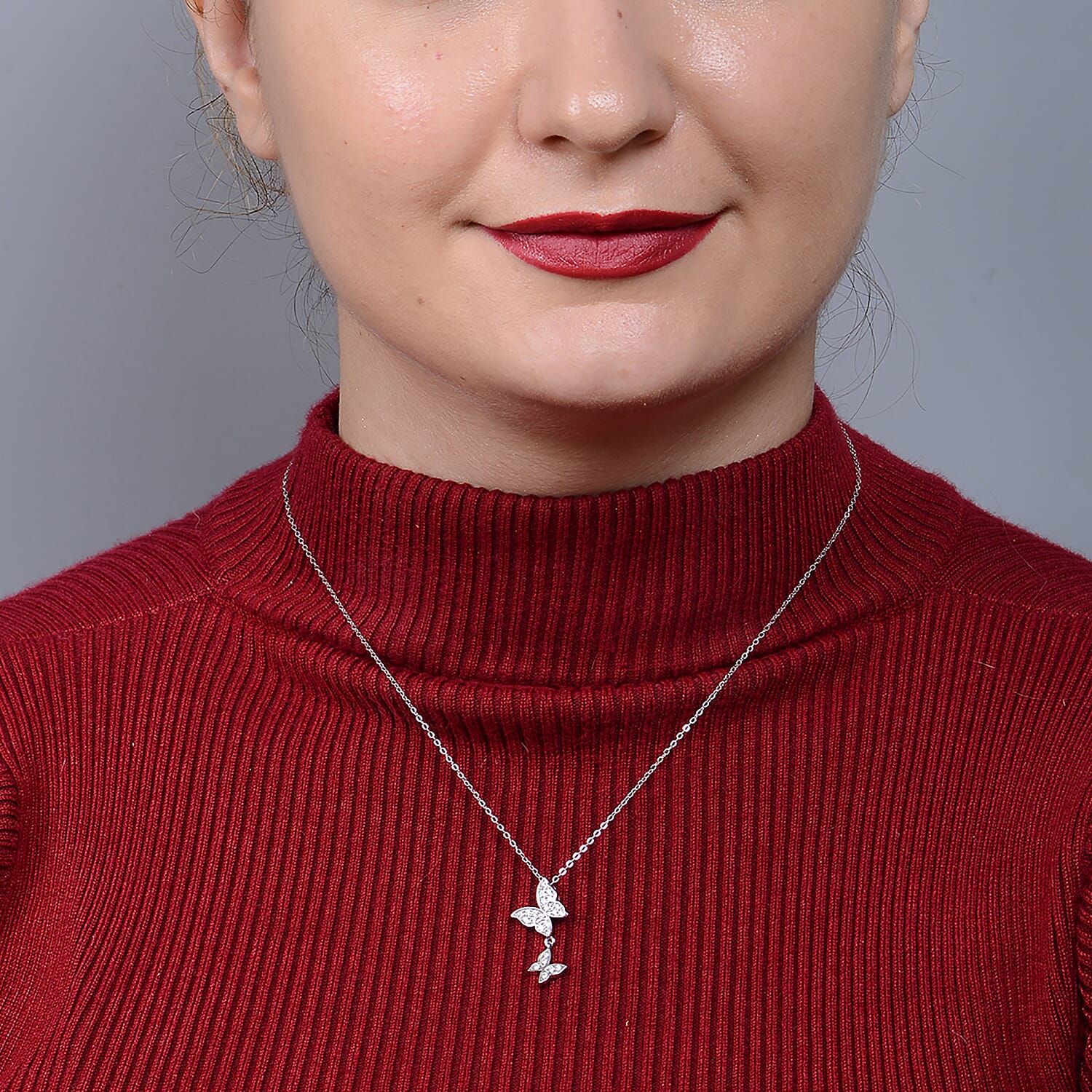 Moissanite Butterfly Pendant in Rhodium Overlay Sterling Silver