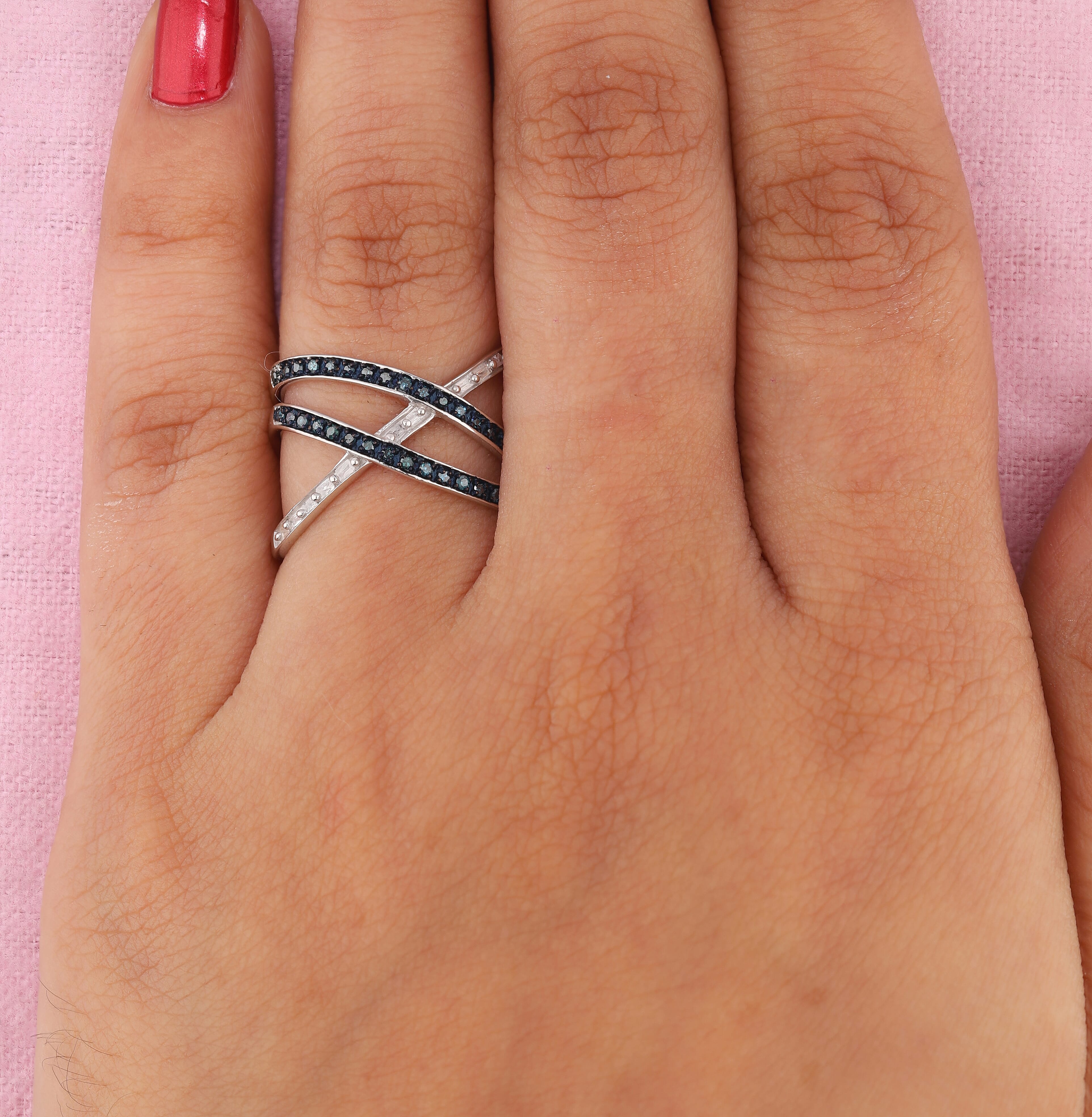 White Diamond and Blue Diamond Criss-Cross Overlap Ring in Platinum Overlay Sterling Silver 0.27 Ct.