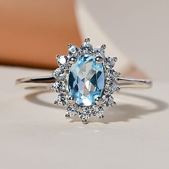 https://tjcuk.sirv.com/Products/38/1/3811747/Sky-Blue-Topaz-Princess-Diana-Inspired-Halo-Ring-with-Natural-Cambodia_3811747_3.jpg?w=342&h=342