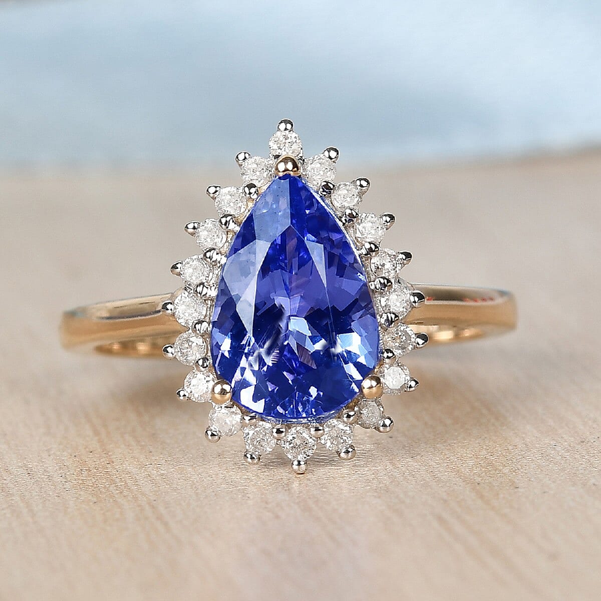Elite Collection- 9K Yellow Gold Tanzanite and Diamond Halo Ring 2.10 Ct.