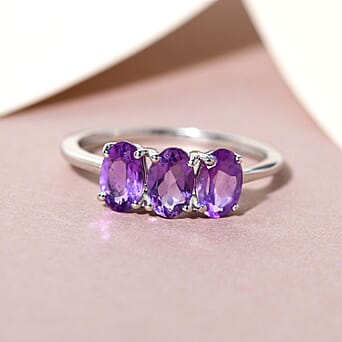 https://tjcuk.sirv.com/Products/38/2/3821611/Amethyst-Trilogy-Ring-in-Platinum-Overlay-Sterling-Silver_3821611_1.jpg?w=342&h=342