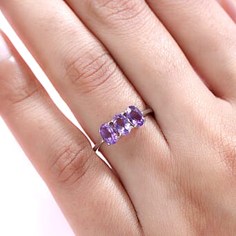 https://tjcuk.sirv.com/Products/38/2/3821611/Amethyst-Trilogy-Ring-in-Platinum-Overlay-Sterling-Silver_3821611_2.jpg?w=342&h=342