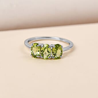 https://tjcuk.sirv.com/Products/38/2/3821657/Hebei-Peridot-Trilogy-Ring-in-Platinum-Overlay-Sterling-Silver_3821657_1.jpg?w=342&h=342