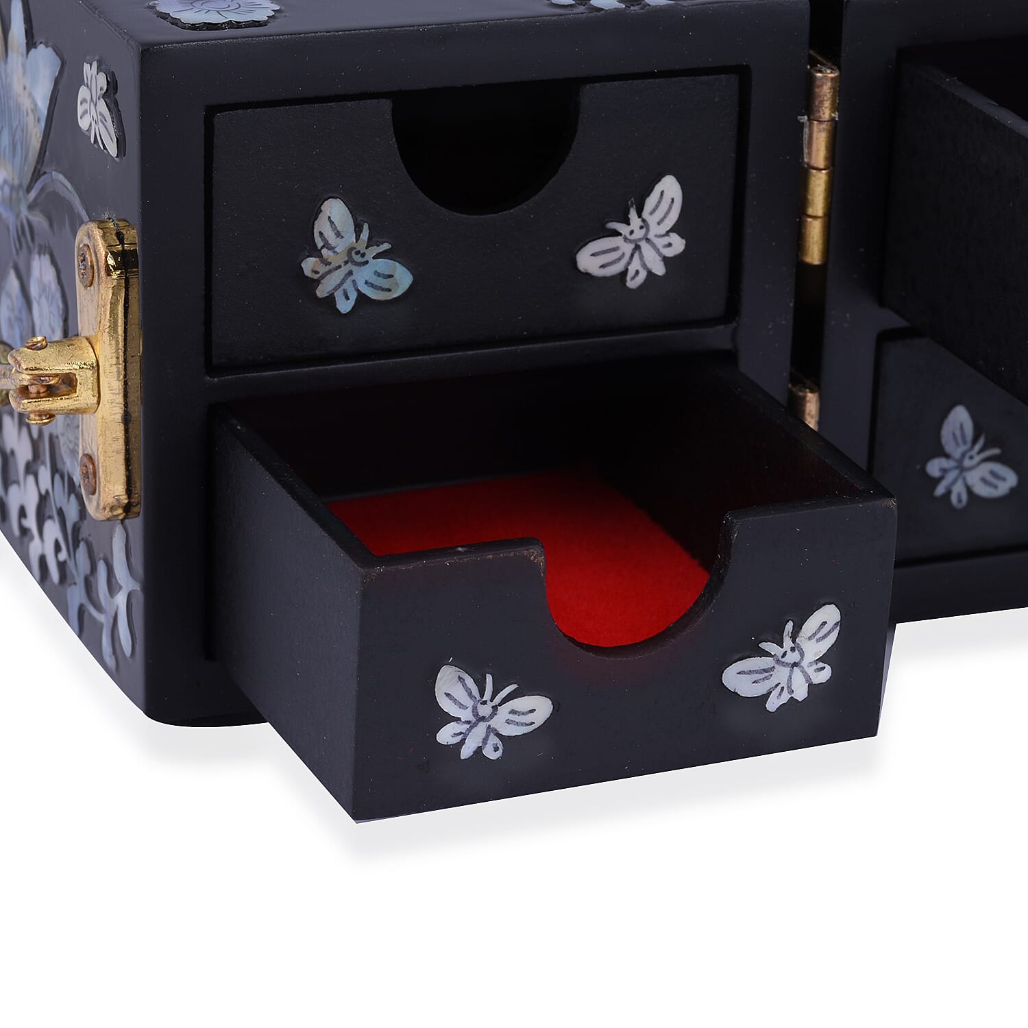 Handcrafted Jewelry boxes Adorned with Butterfly pearl shell inlay artwork Features 4 tiny drawers hidden when closed Unique two-squared shaped box design Easy to open at 180 degrees In