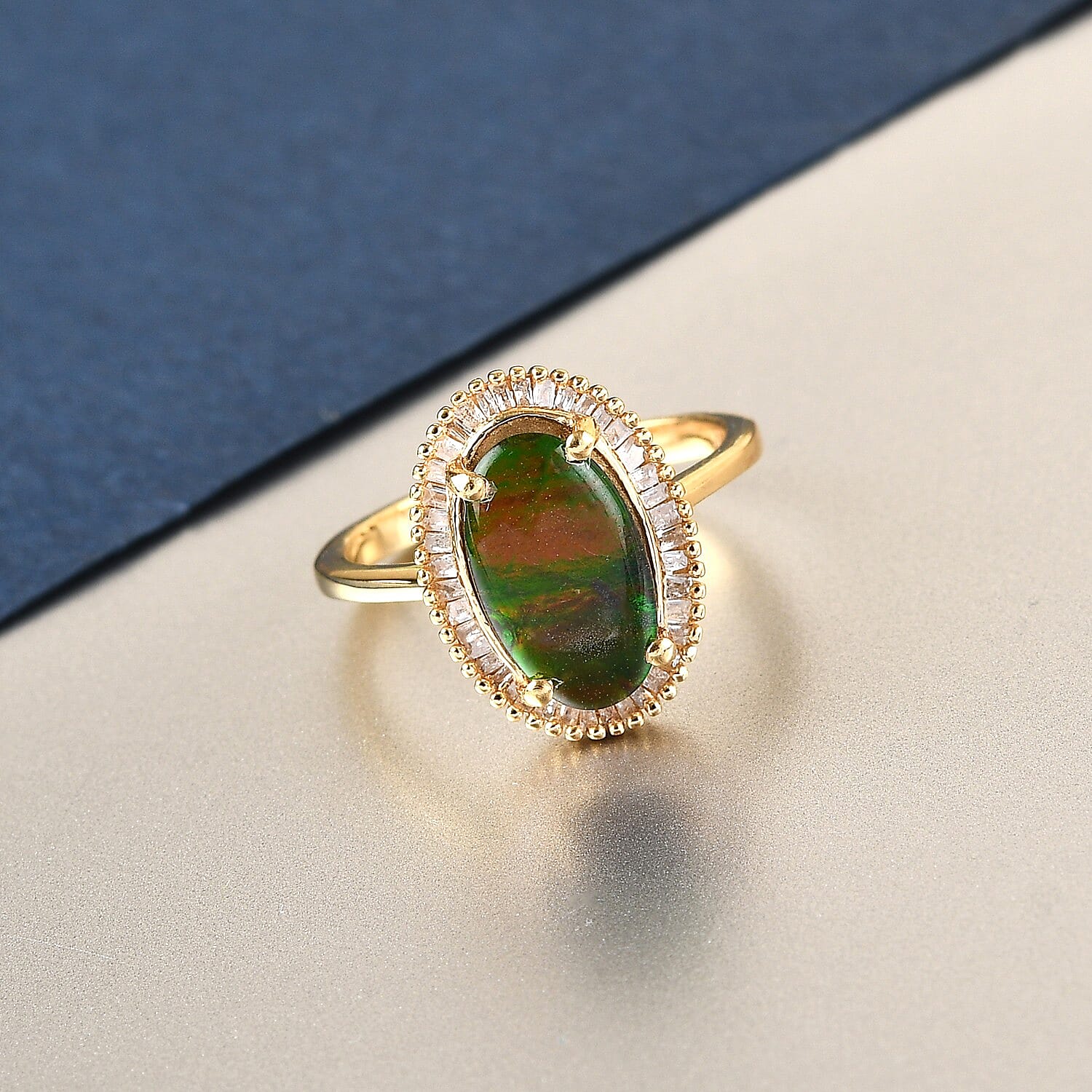 Canadian Ammolite (Ovl 12x7mm) and Diamond (0.25cts) Ring in 14K Gold Overlay Sterling Silver 2.44 Ct.