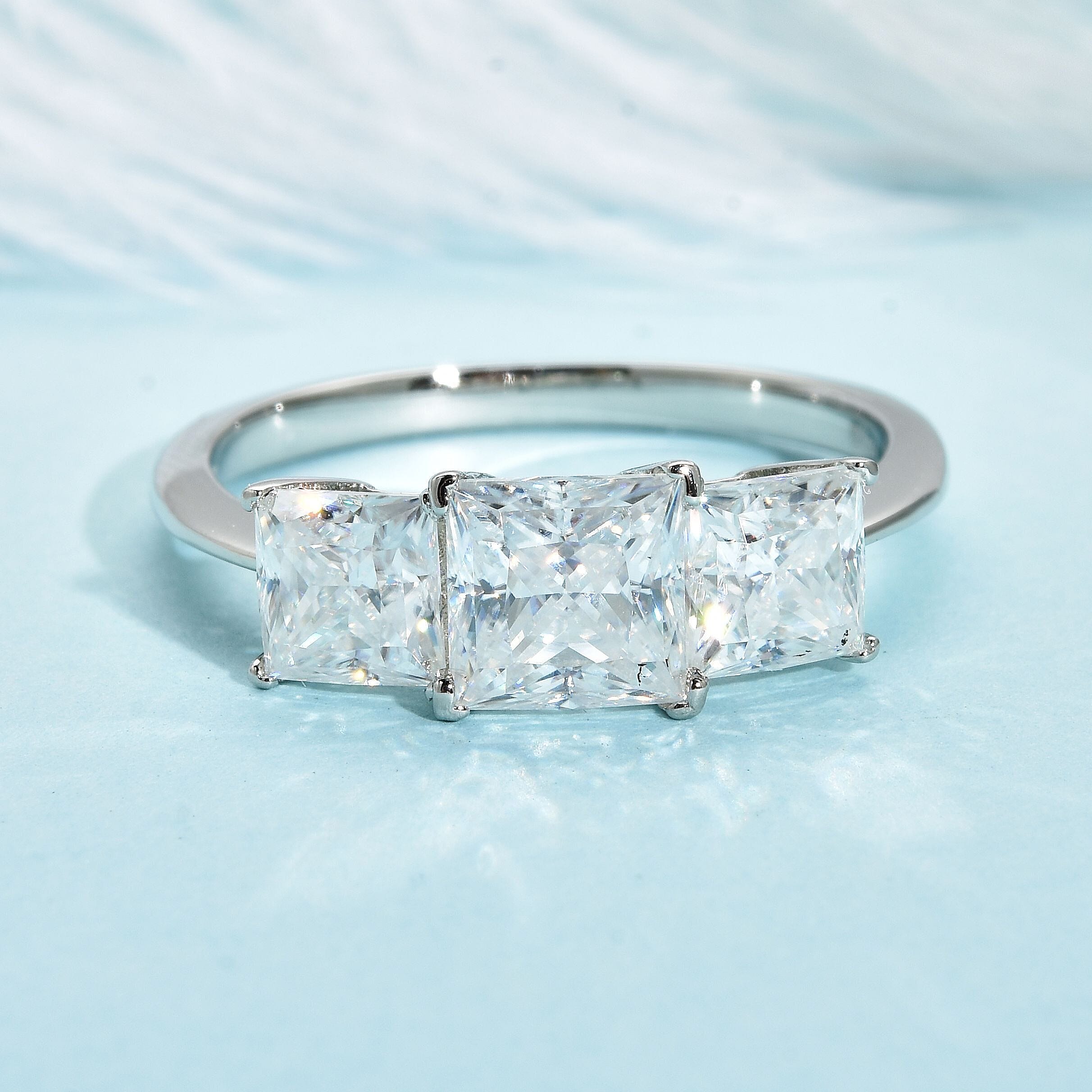 Moissanite Trilogy Ring in Rhodium Overlay Sterling Silver 2.00 Ct.