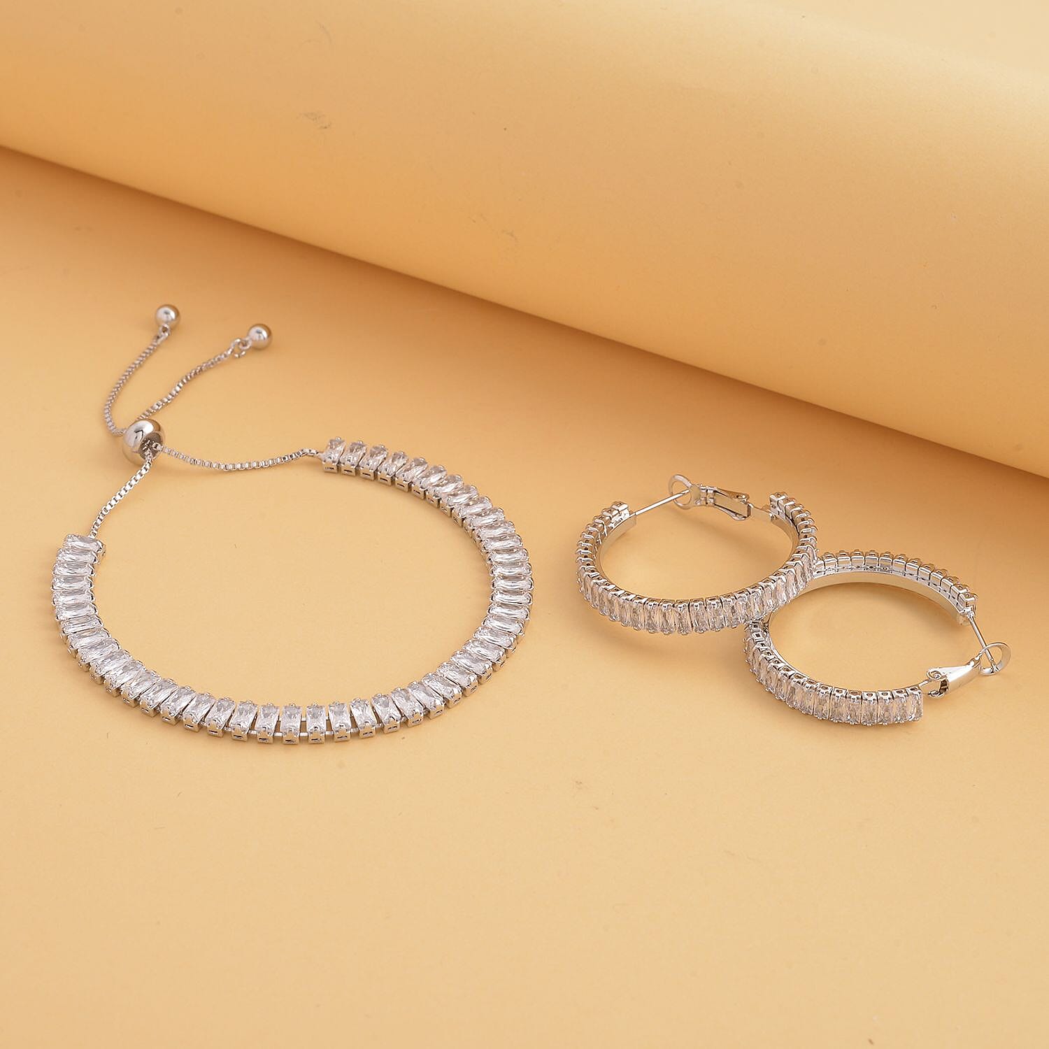 2 Piece Set -  White Cubic Zirconia Bracelet ( Adjustable 6 to 9 inch) and Earring (with Clasp) Pure White Brass  19.500  Ct.