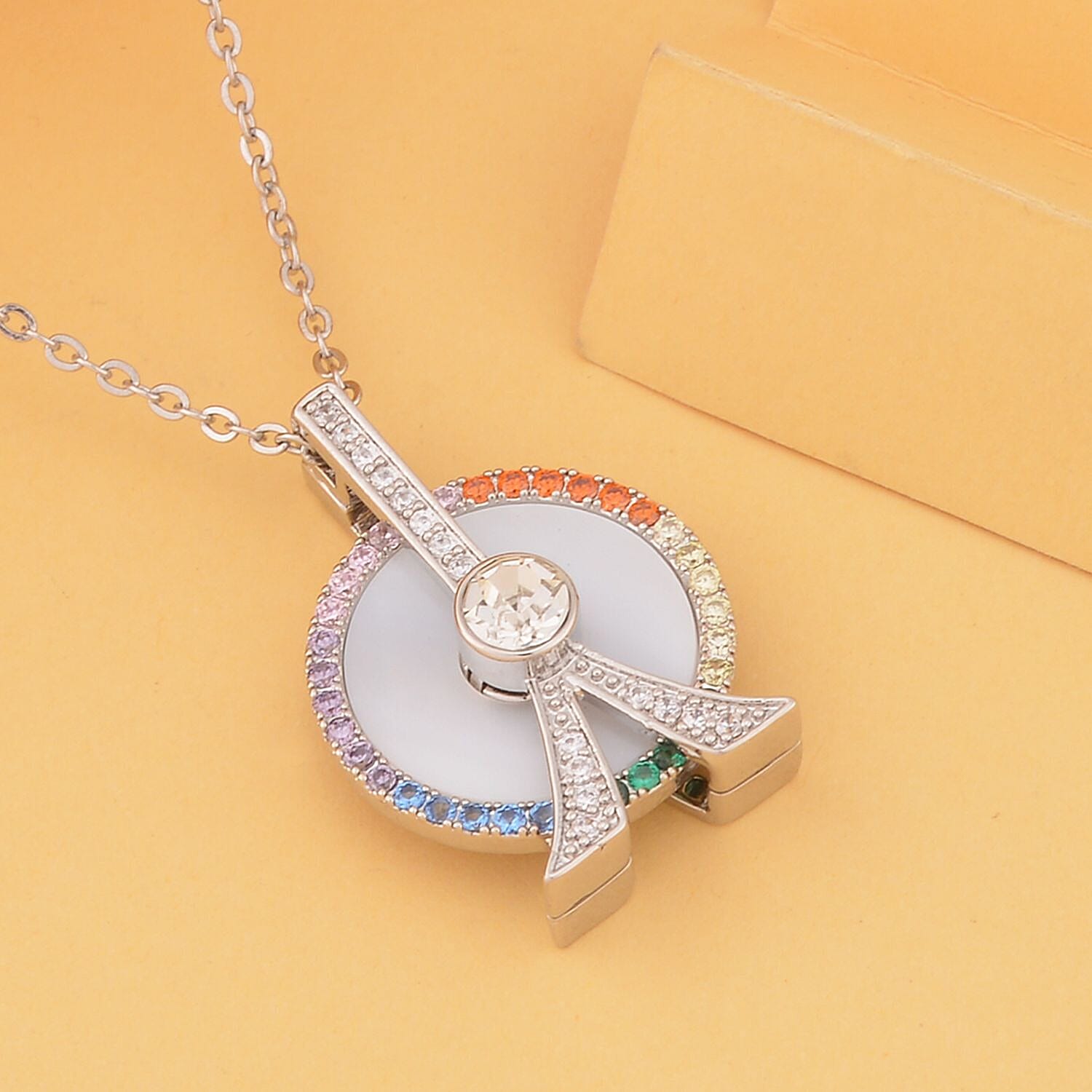 Mother Of Pearl and Simulated Rainbow Sapphire Ferris Wheel Pendant with Chain (Size - 20-2 Inch) in Silver Tone