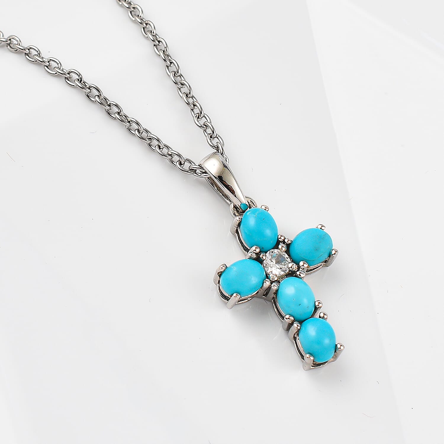 Arizona Sleeping Beauty Turquoise and Natural Zircon Cross Pendant in Platinum Overlay Sterling Silver with Stainless Steel Chain (Size-20)