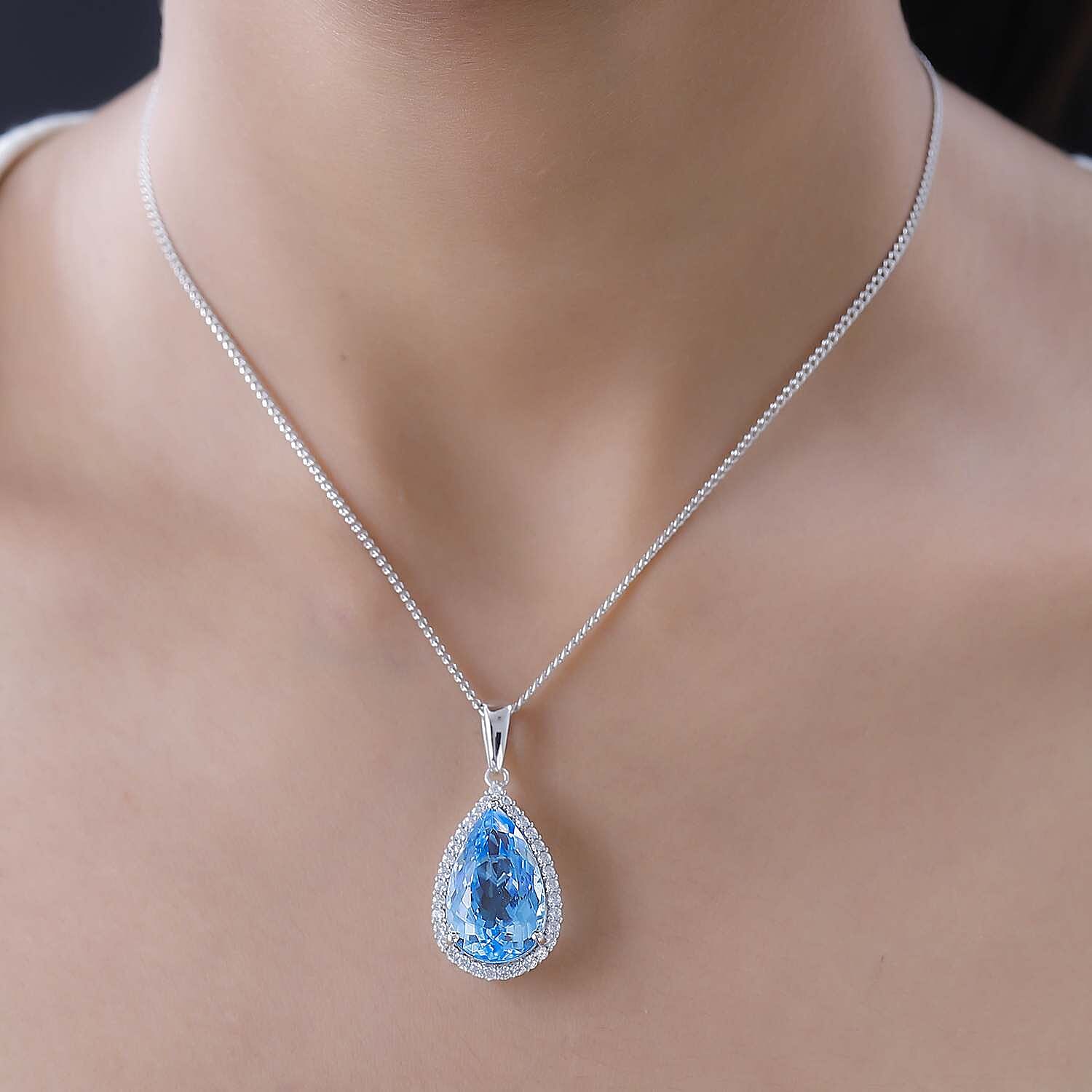 Blue Topaz & Natural Zircon Halo Pendant with Chain (Size 20) in Platinum Overlay Sterling Silver 26.30 Ct, Silver Wt. 7.71 Gms