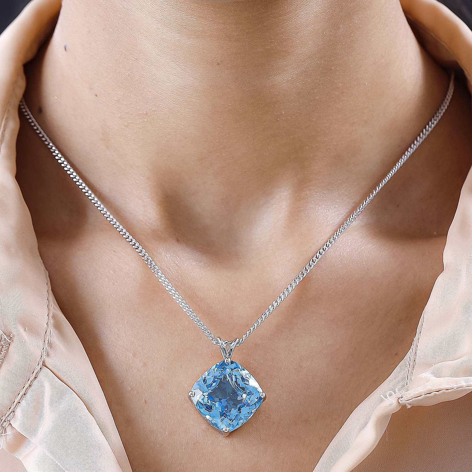 Blue Topaz Solitaire Pendant with Chain (Size 20) in Platinum Overlay Sterling Silver 34.78 Ct, Silver Wt. 11.09 Gms