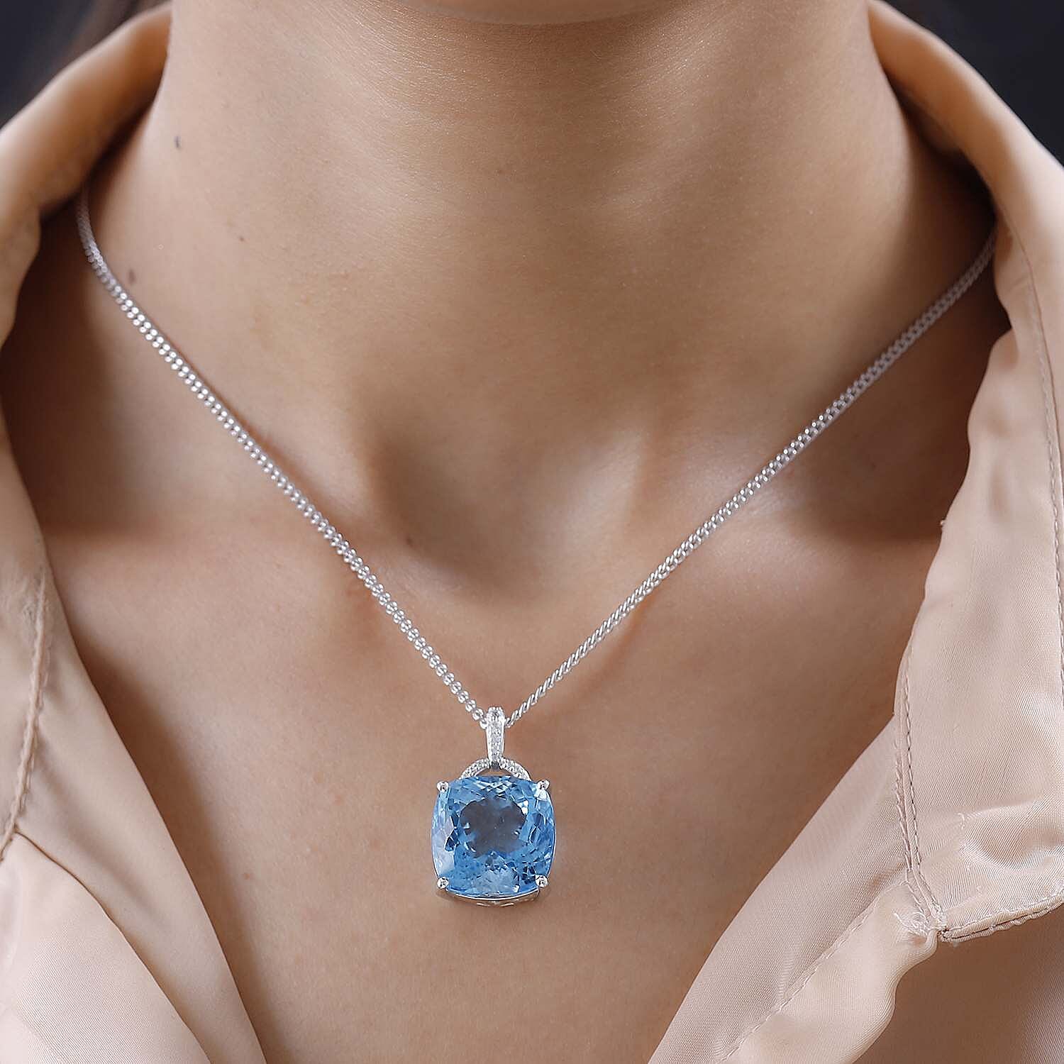 Blue Topaz,  White Zircon Pendant with Chain (Size 20) in Platinum Overlay Sterling Silver 0.13 ct  Silver Wt. 10.74 Gms  30.880  Ct.