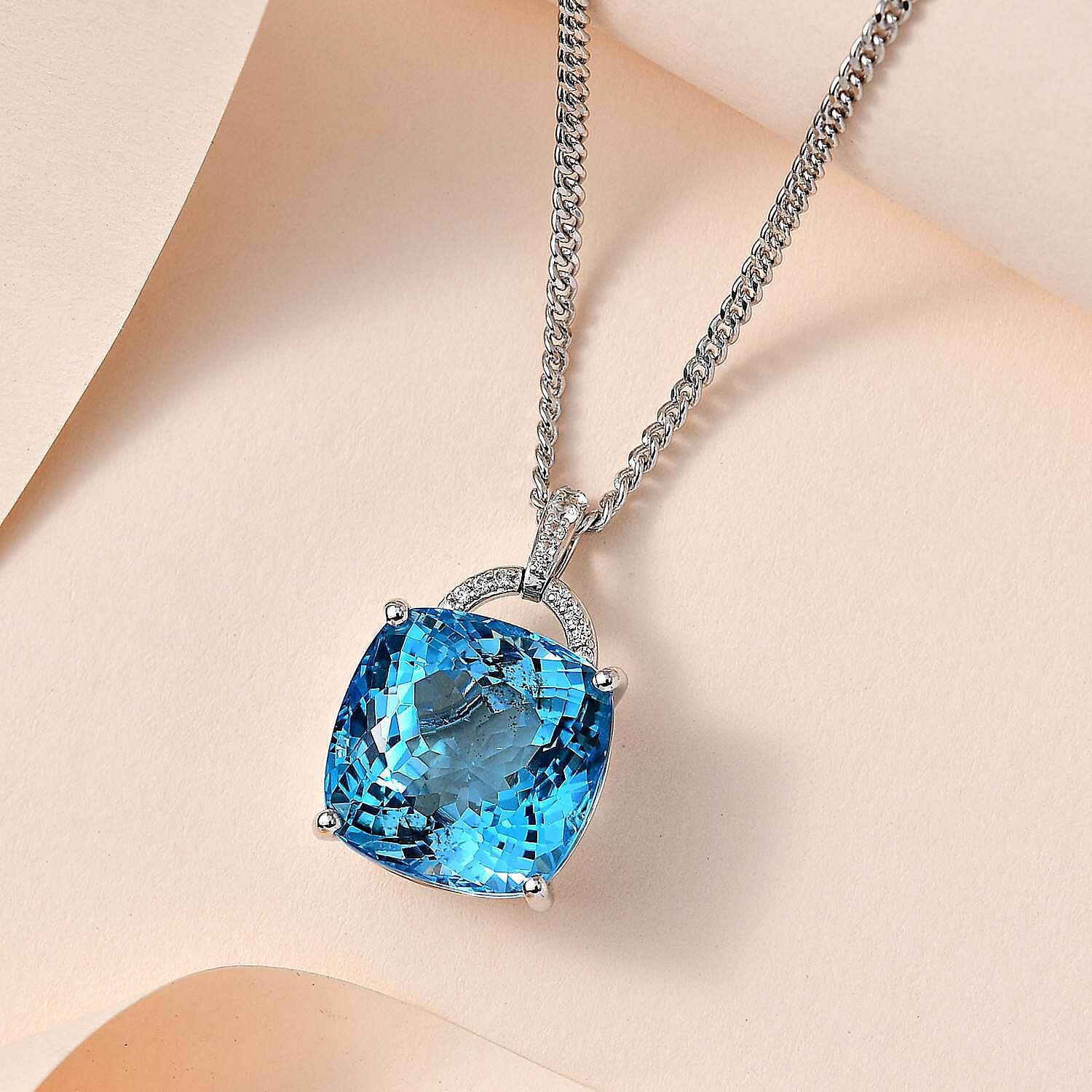 Blue Topaz,  White Zircon Pendant with Chain (Size 20) in Platinum Overlay Sterling Silver 0.13 ct  Silver Wt. 10.74 Gms  30.880  Ct.