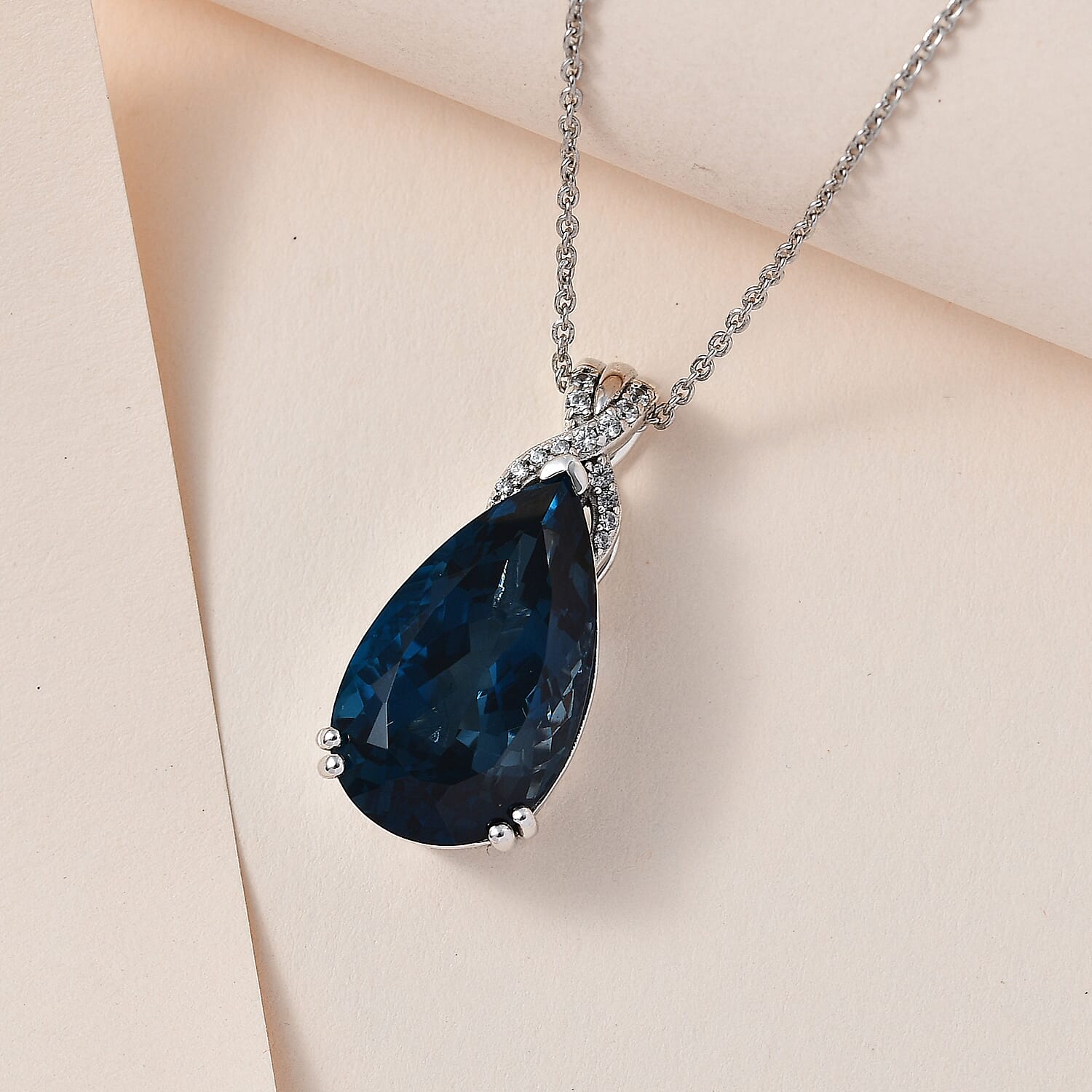 London Blue Topaz & Natural Zircon Drop Pendant with Chain (Size 20) in Platinum Overlay Sterling Silver 25.14 Ct, Silver Wt. 8.10 Gms