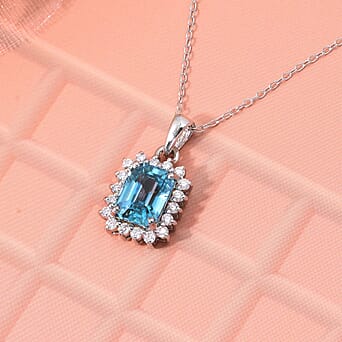 https://tjcuk.sirv.com/Products/42/6/4267549/Blue-Zircon-Moissanite-Halo-Pendant-with-Chain-Size-20-in-Rhodium-Over_4267549_1.jpg?w=342&h=342