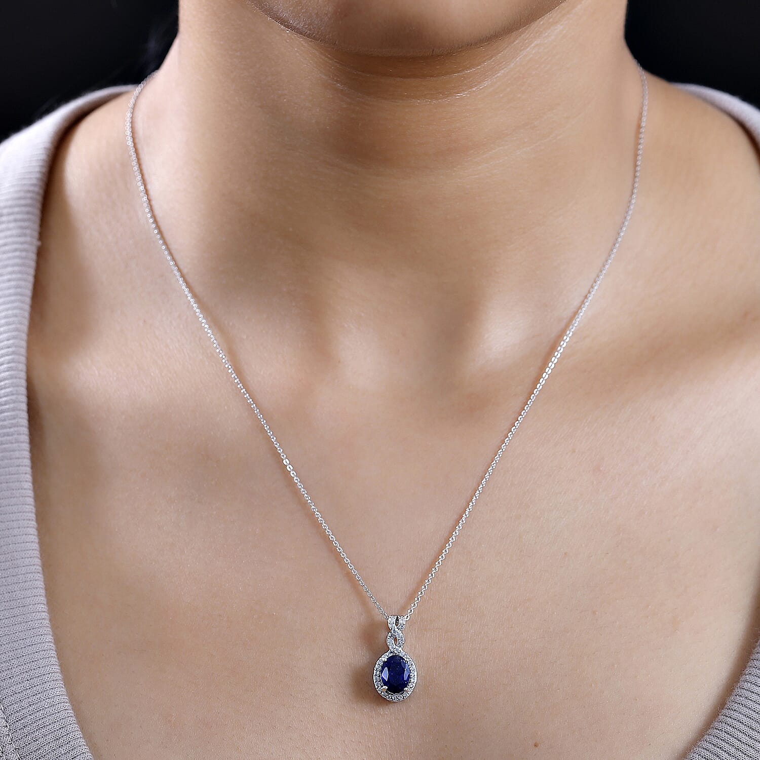 Fissure Filled Blue Sapphire,  White Zircon Pendant with Chain (Size 20) in rhodium Sterling Silver 0.44 ct  1.990  Ct.