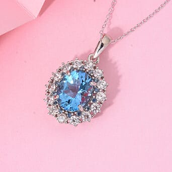 https://tjcuk.sirv.com/Products/43/7/4375246/Swiss-Blue-Topaz-White-Zircon-Blue-Sapphire-Pendant-with-Chain-Size-20_4375246_2.jpg?w=342&h=342
