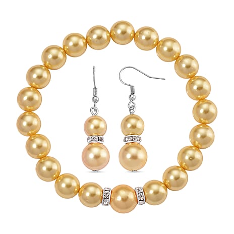 2 Piece Set - Golden Shell Pearl & Austrian White Crystal Earring with Hook & Strechable Bracelet (Size - 7.5) 169.00 Ct.
