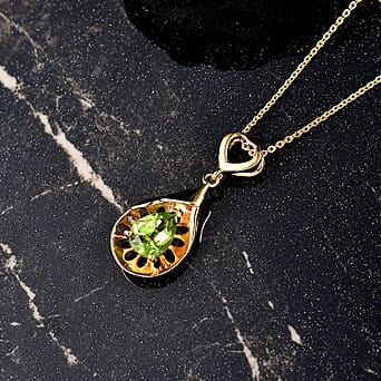 https://tjcuk.sirv.com/Products/44/1/4411438/Peridot-Pendant-with-Torn-Chain-19DC-Size-20-Sterling-Silver-1-050-Ct_4411438_2.jpg?w=342&h=342