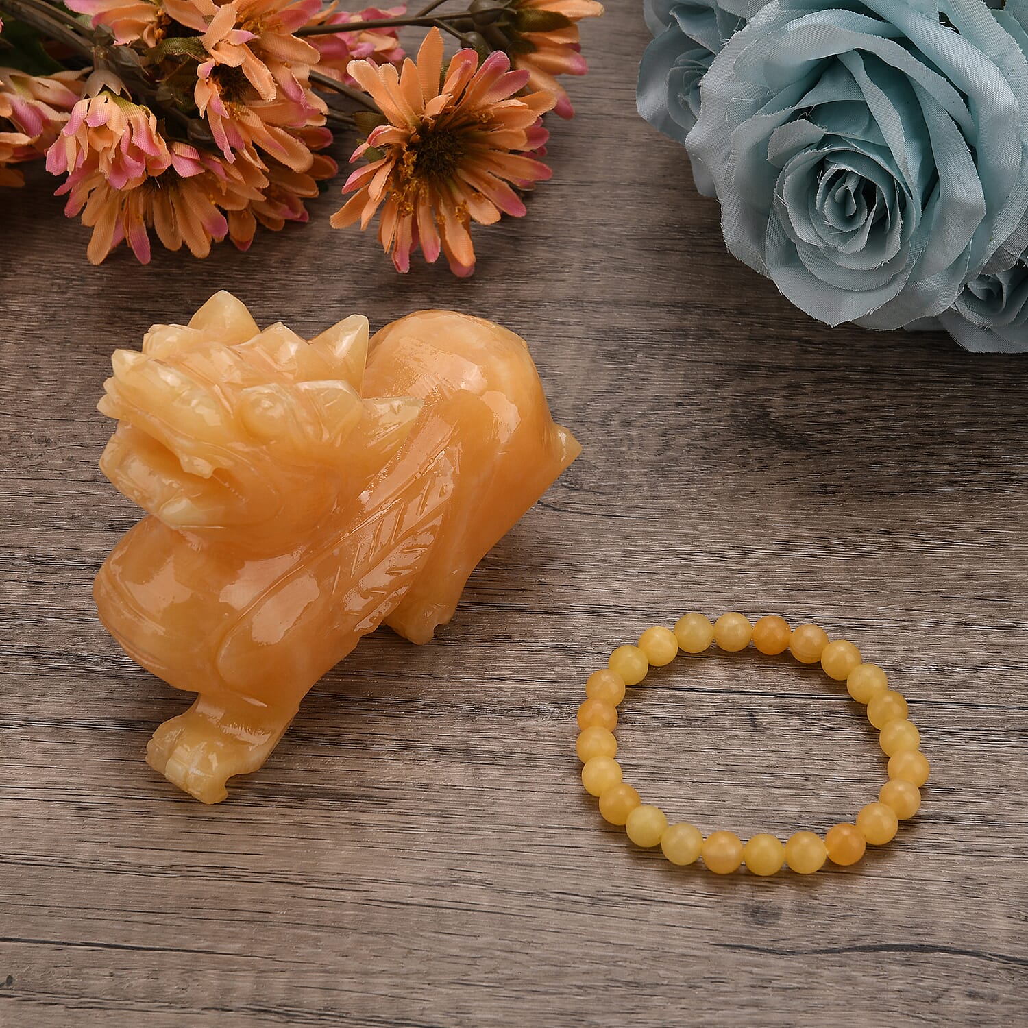 The Carved Treasure Collection - Honey Serpentine Carved Qi Lin Ornament 3215.00 Ct.