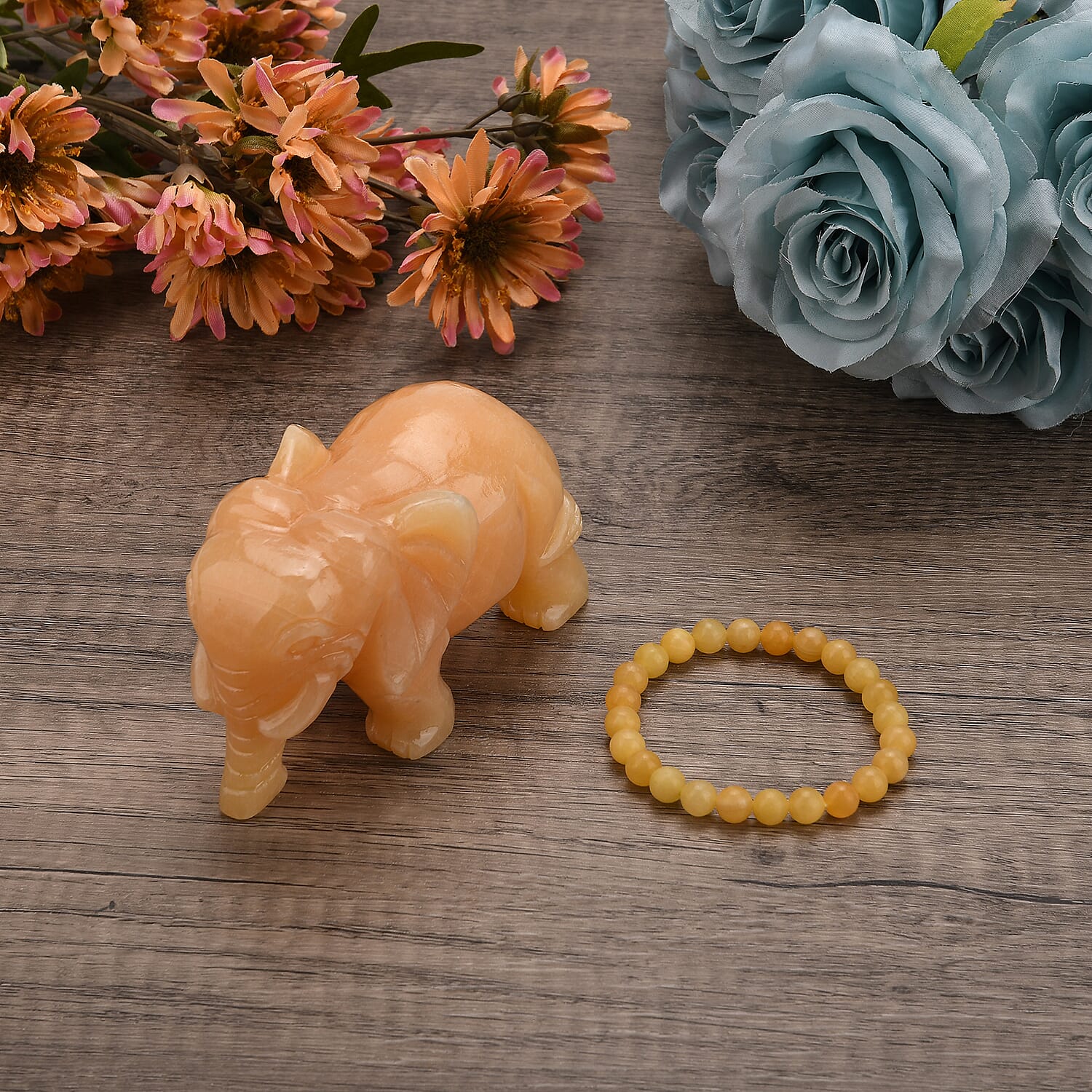 The Carved Treasure Collection - Honey Serpentine Carved Elephant Ornament 3205.00 Ct.