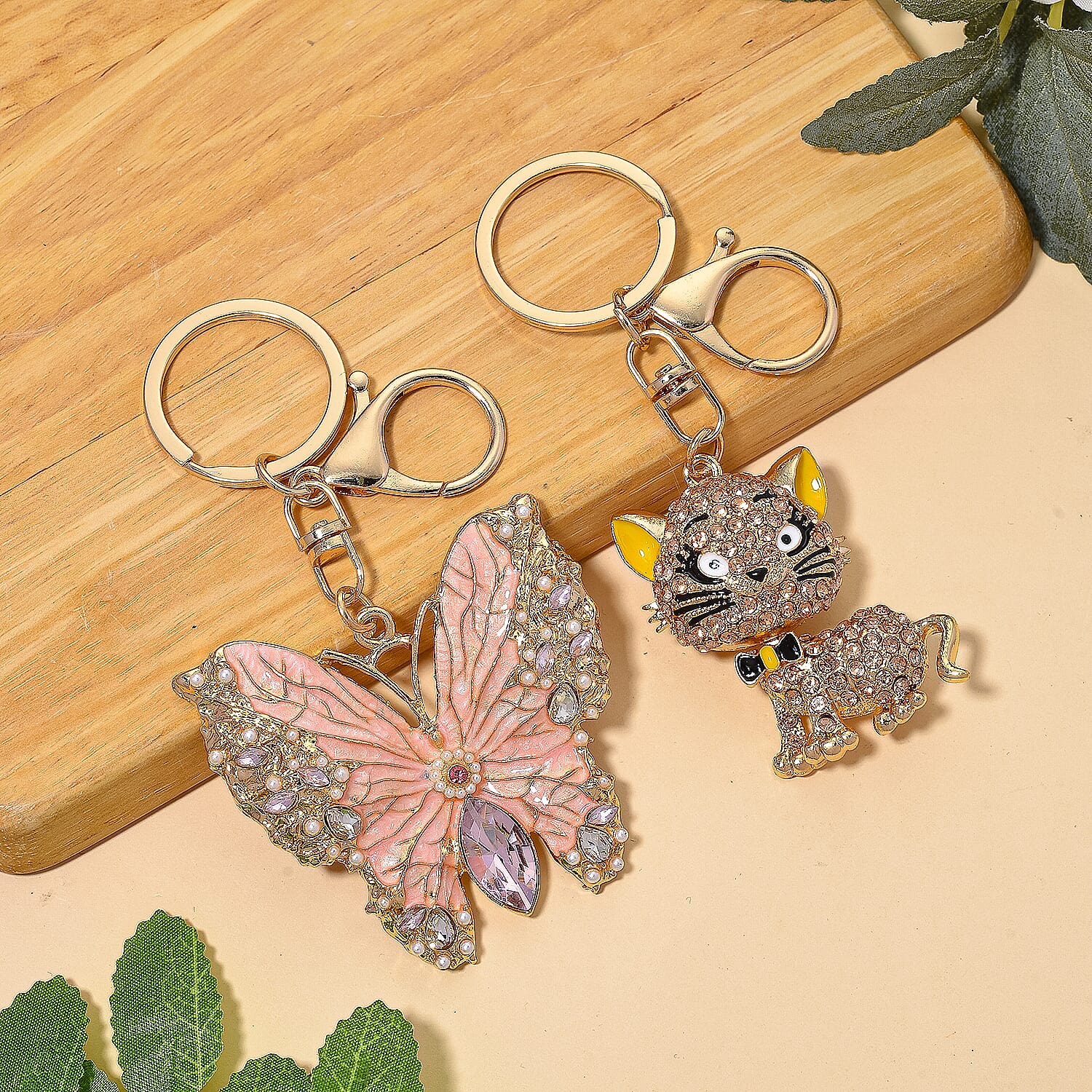 Set of 2 - White Crystal & Simulated Pearl Elegant Butterfly & Playful Cat Keychain in Yellow Gold Plated