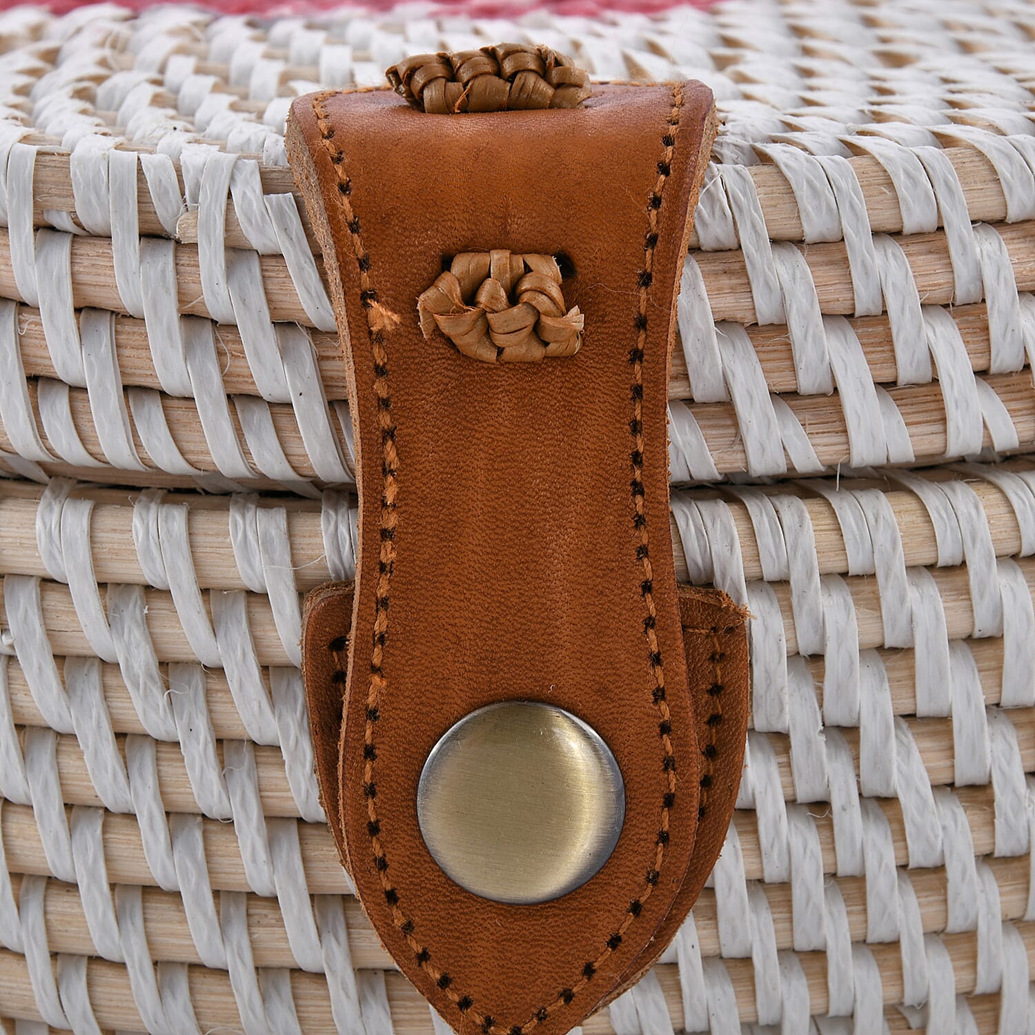 rounded rattan bag with leather strap
