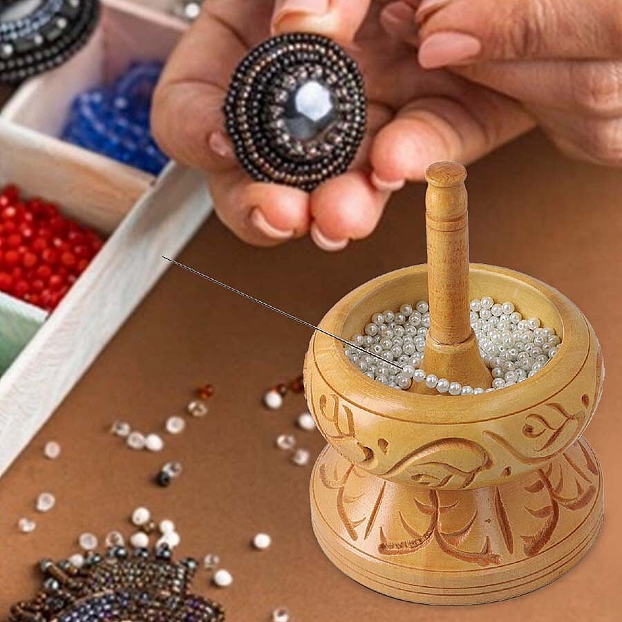Haldoo Wood Carved Bead Spinner With Stainless Steel Needle. Spinner- 14 x 10.2 cm. Needle- 14 x 2.54 cm. WEIGHT- Approx. 0.55 lbs.