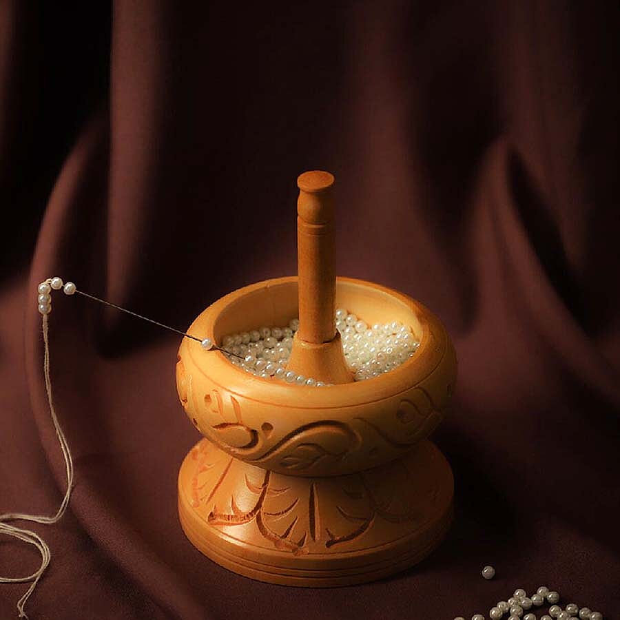Haldoo Wood Carved Bead Spinner With Stainless Steel Needle. Spinner- 14 x 10.2 cm. Needle- 14 x 2.54 cm. WEIGHT- Approx. 0.55 lbs.