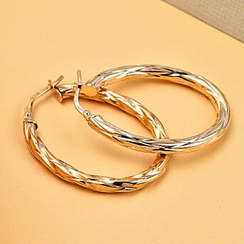 https://tjcuk.sirv.com/Products/60/9/6092919/9K-Yellow-Gold-23MM-31MM-Patterned-Oval-Hoop-Creole-Earrings-1.6-grams_6092919_1.jpg?w=342&h=342