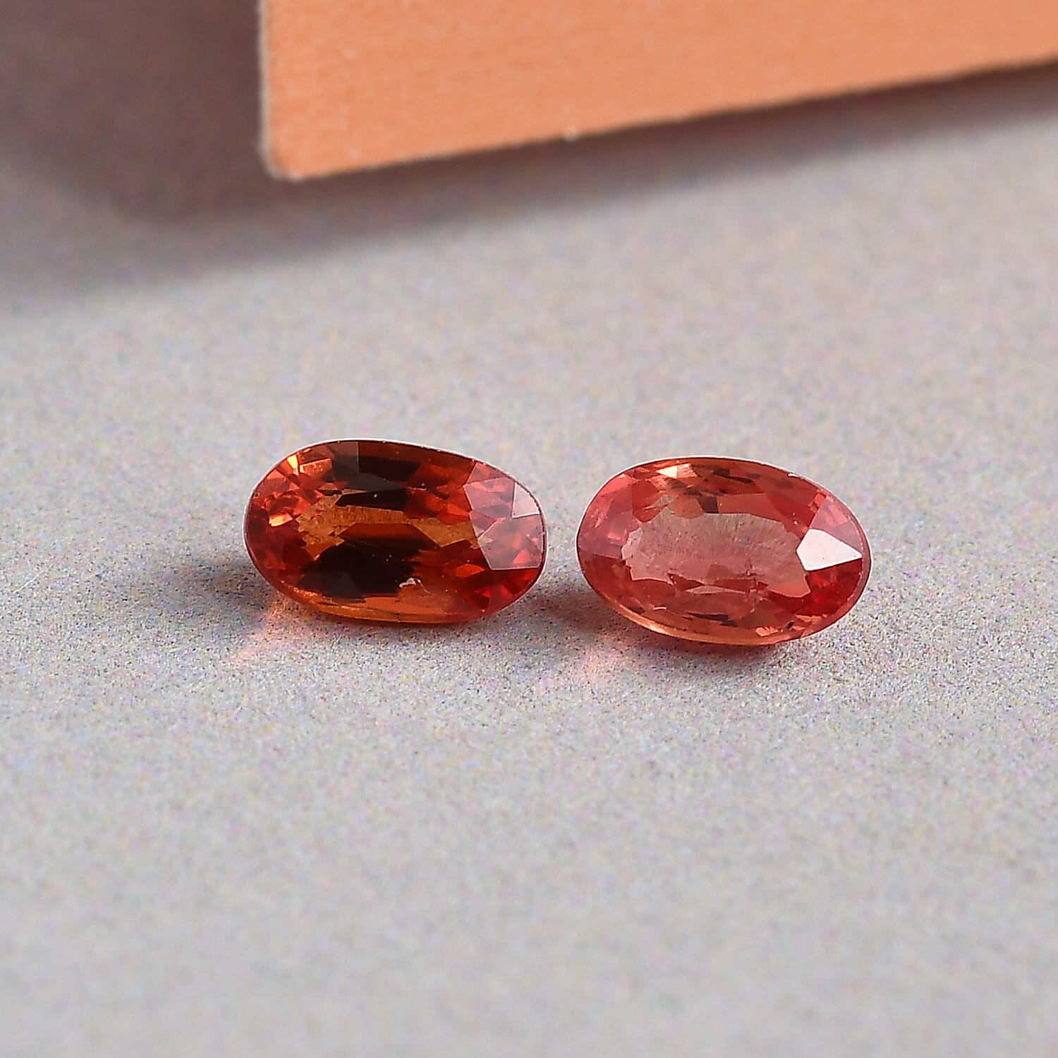 Set of 2 - AAA Orange Sapphire Oval 5x3 mm 0.54 Ct.