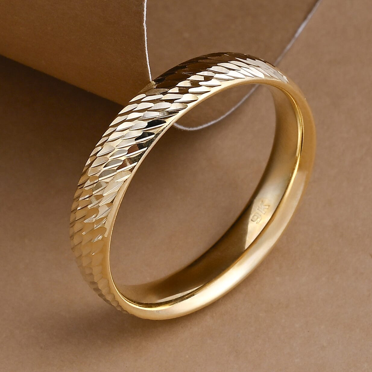 Close Out Deal - 9K Yellow Gold Diamond Cut Band Ring